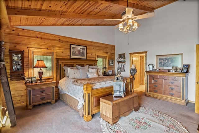 carpeted bedroom featuring wood ceiling and wooden walls