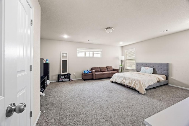 bedroom featuring carpet floors, baseboards, and recessed lighting