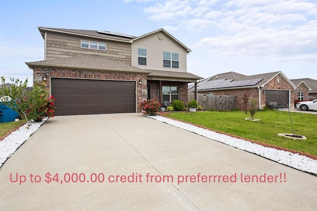 view of front of property with roof mounted solar panels, concrete driveway, an attached garage, brick siding, and a shingled roof