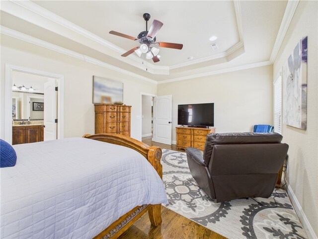 5708 S 60th Pl, Rogers, AR 72758 - bedroom with a raised ceiling, wood finished floors, crown molding, a ceiling fan, and connected bathroom