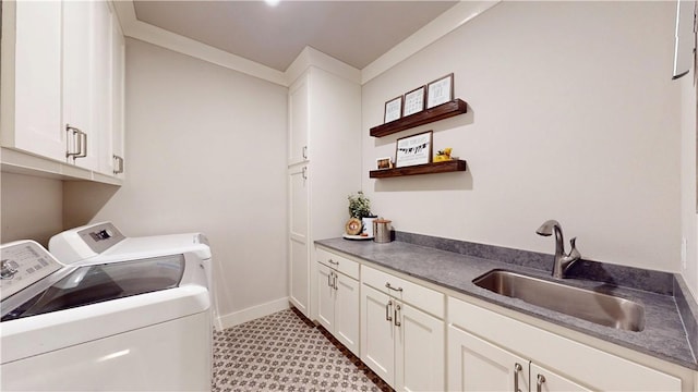 laundry area featuring independent washer and dryer, cabinet space, baseboards, and light flooring