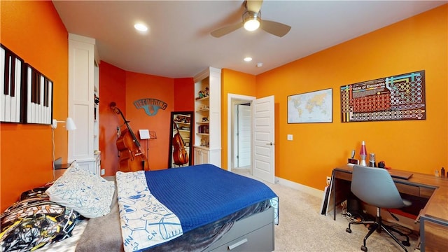 bedroom with light carpet, an office area, recessed lighting, a ceiling fan, and baseboards