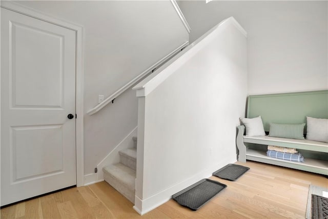 2630 N Gulley Grove Cir, Fayetteville, AR 72703 - stairway with wood finished floors and baseboards