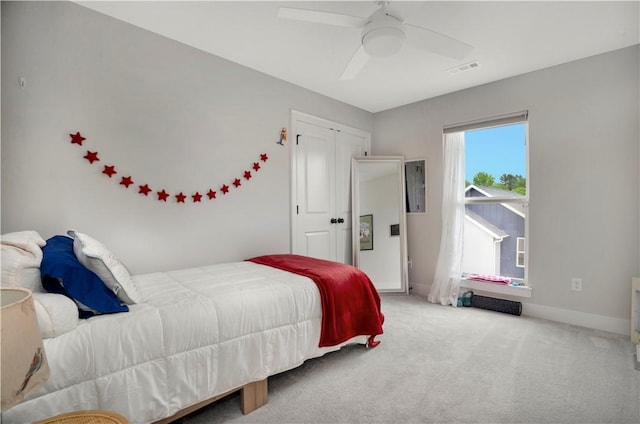 2630 N Gulley Grove Cir, Fayetteville, AR 72703 - bedroom with carpet flooring, baseboards, and a ceiling fan