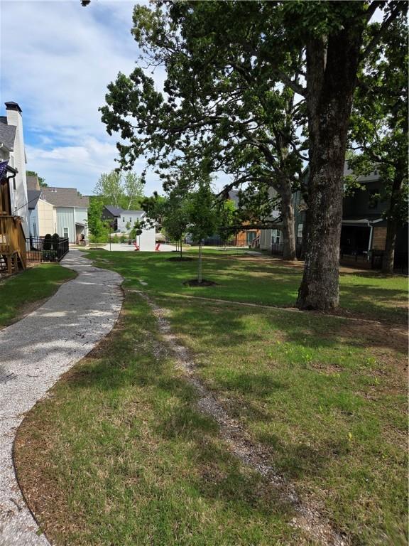 2630 N Gulley Grove Cir, Fayetteville, AR 72703 - surrounding community with a yard