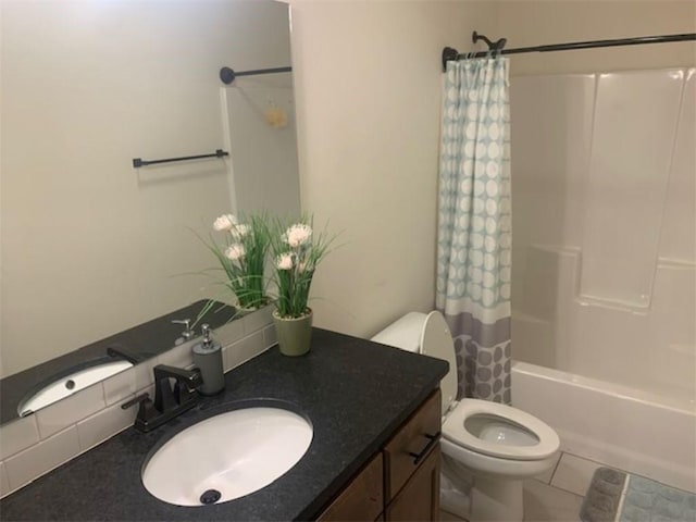 214 Hunt St, Pea Ridge, AR 72751 - bathroom featuring toilet, vanity, shower / bath combo, and tile patterned floors