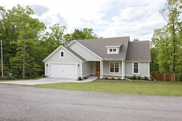 29 Salen Ln, Bella Vista, AR 72715 - view of front of property with an attached garage, driveway, a shingled roof, and board and batten siding