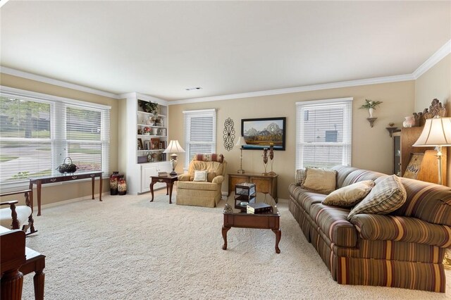 carpeted living room with crown molding, plenty of natural light, and baseboards