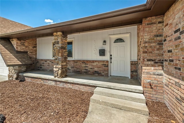 1104 S 12th St, Rogers, AR 72756 - entrance to property featuring brick siding and a porch