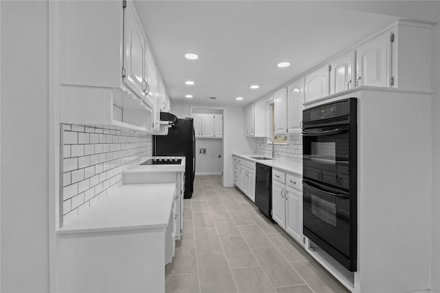 1104 S 12th St, Rogers, AR 72756 - kitchen featuring black appliances, a sink, backsplash, recessed lighting, and white cabinetry