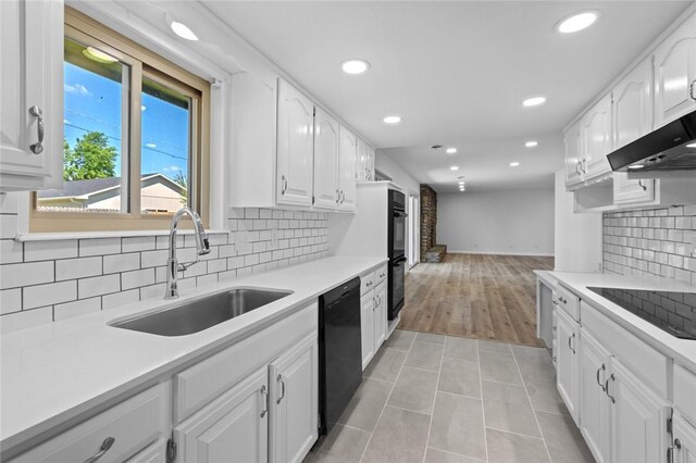 1104 S 12th St, Rogers, AR 72756 - kitchen featuring black appliances, a sink, recessed lighting, backsplash, and light tile patterned floors