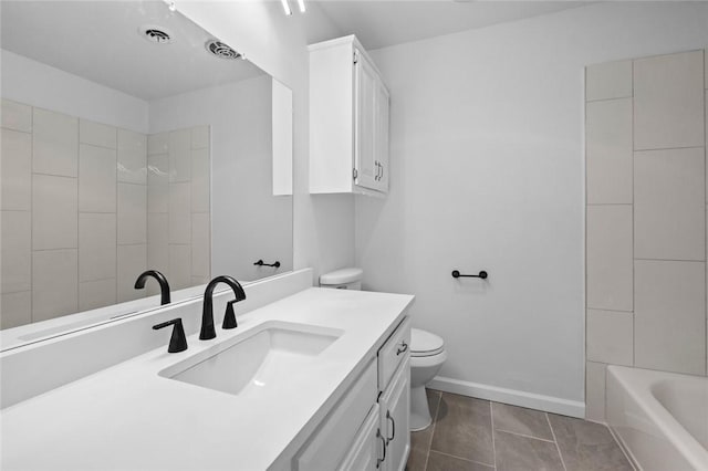 1104 S 12th St, Rogers, AR 72756 - full bathroom with toilet, vanity, baseboards, and tile patterned floors
