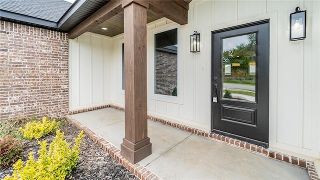 181 Magazine, Prairie Grove, AR 72753 - property entrance with board and batten siding and brick siding