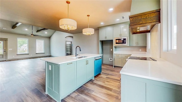 181 Magazine, Prairie Grove, AR 72753 - kitchen with a sink, stainless steel microwave, dishwashing machine, light wood-style floors, and recessed lighting