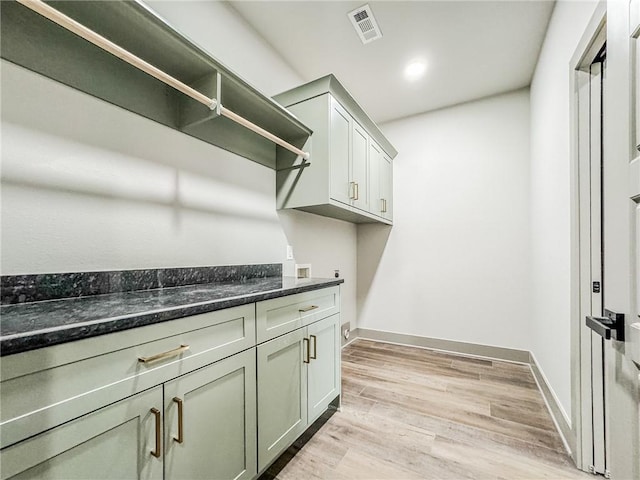 181 Magazine, Prairie Grove, AR 72753 - clothes washing area featuring cabinet space, light wood finished floors, hookup for a washing machine, electric dryer hookup, and baseboards