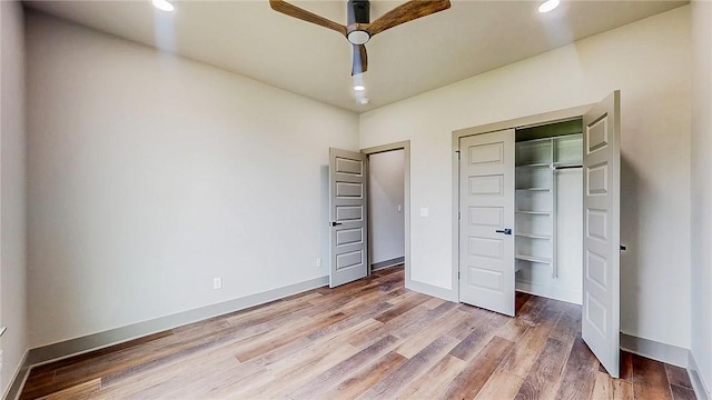 181 Magazine, Prairie Grove, AR 72753 - unfurnished bedroom featuring light wood-style flooring, baseboards, recessed lighting, a closet, and ceiling fan