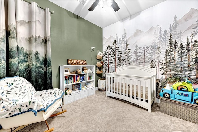 carpeted bedroom with ceiling fan