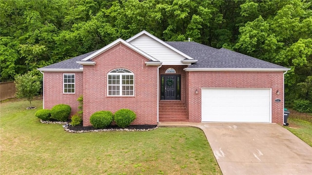 701 W Thornstone Ave, West Fork, AR 72774 - view of front of house featuring a garage, brick siding, concrete driveway, and a front lawn