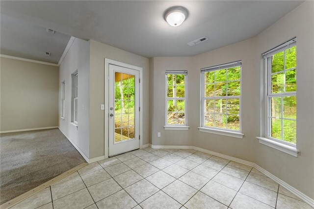 701 W Thornstone Ave, West Fork, AR 72774 - doorway featuring baseboards, light tile patterned floors, and crown molding