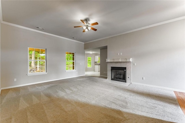 701 W Thornstone Ave, West Fork, AR 72774 - unfurnished living room featuring ceiling fan, baseboards, ornamental molding, and carpet flooring