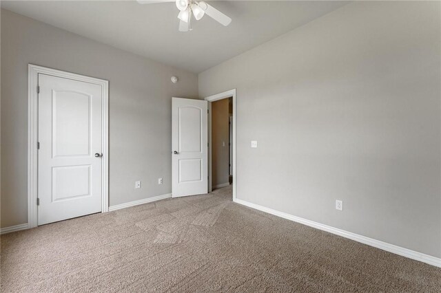 701 W Thornstone Ave, West Fork, AR 72774 - unfurnished bedroom featuring carpet flooring, baseboards, and a ceiling fan