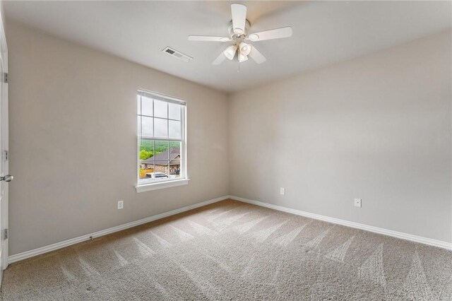 701 W Thornstone Ave, West Fork, AR 72774 - empty room with carpet flooring, baseboards, and a ceiling fan