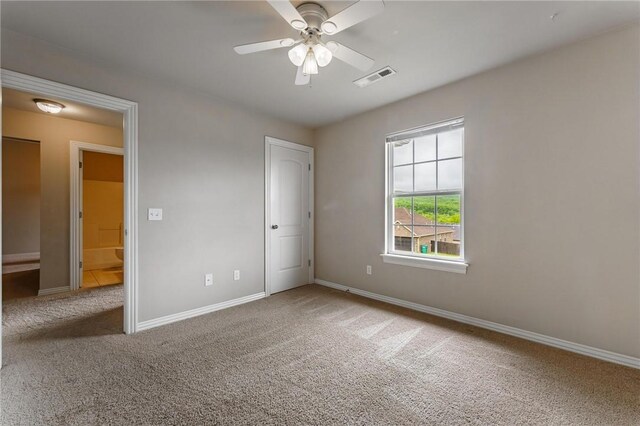 701 W Thornstone Ave, West Fork, AR 72774 - unfurnished bedroom featuring carpet, baseboards, and ceiling fan