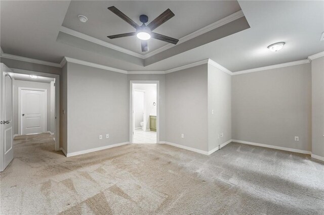 701 W Thornstone Ave, West Fork, AR 72774 - spare room featuring a raised ceiling, ceiling fan, carpet, ornamental molding, and baseboards