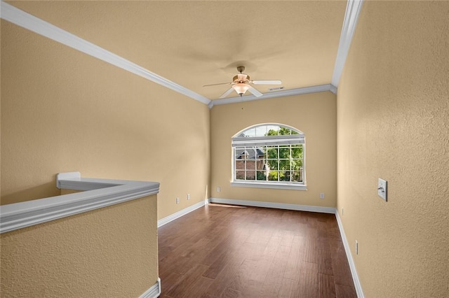 3907 NE Cadbury Ave, Bentonville, AR 72712 - empty room featuring ornamental molding, dark wood finished floors, ceiling fan, a textured wall, and baseboards