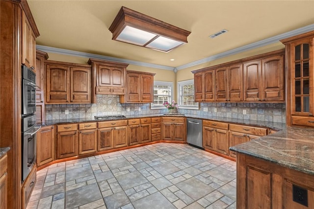 3907 NE Cadbury Ave, Bentonville, AR 72712 - kitchen with appliances with stainless steel finishes, brown cabinets, stone finish flooring, and crown molding