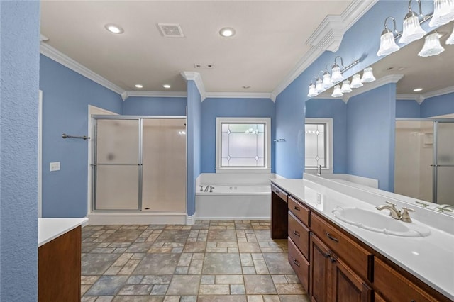3907 NE Cadbury Ave, Bentonville, AR 72712 - bathroom featuring a stall shower, stone finish floors, a garden tub, vanity, and recessed lighting