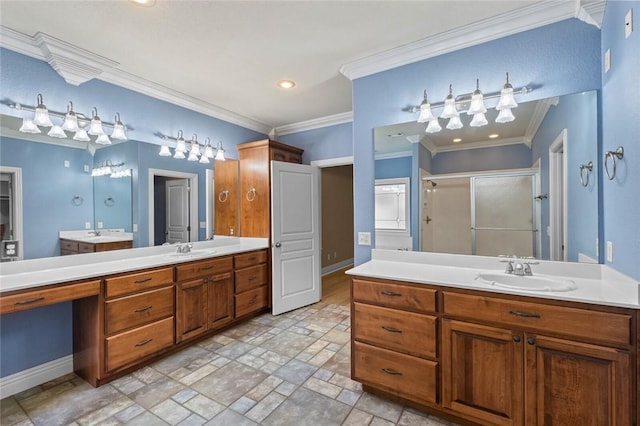 3907 NE Cadbury Ave, Bentonville, AR 72712 - full bath featuring a shower stall, two vanities, stone finish flooring, recessed lighting, and ornamental molding