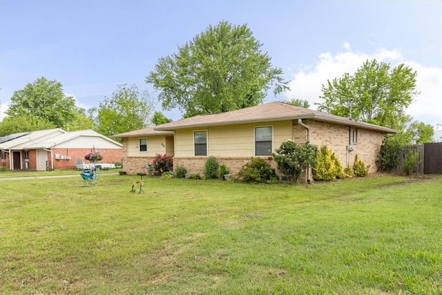 rear view of property featuring brick siding