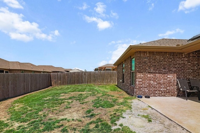 6005 Sherman St, Bentonville, AR 72713 - fenced backyard featuring a patio