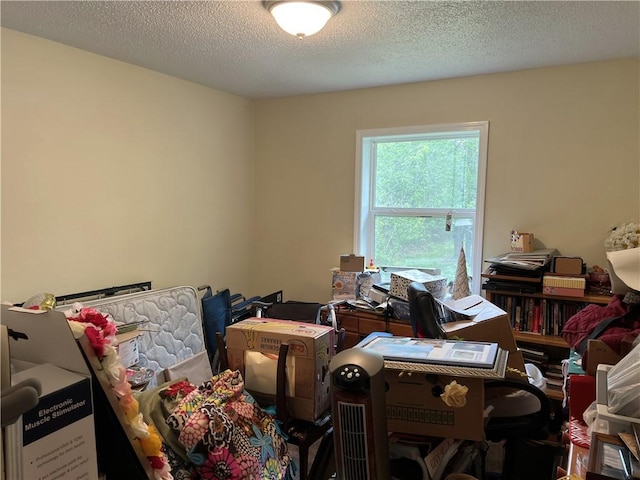 misc room with a textured ceiling