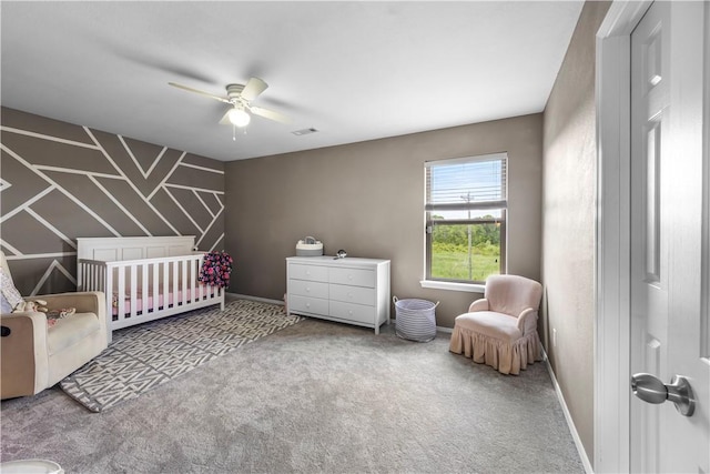 4208 SW Fieldstone Blvd, Bentonville, AR 72712 - bedroom featuring carpet floors, a nursery area, ceiling fan, and baseboards