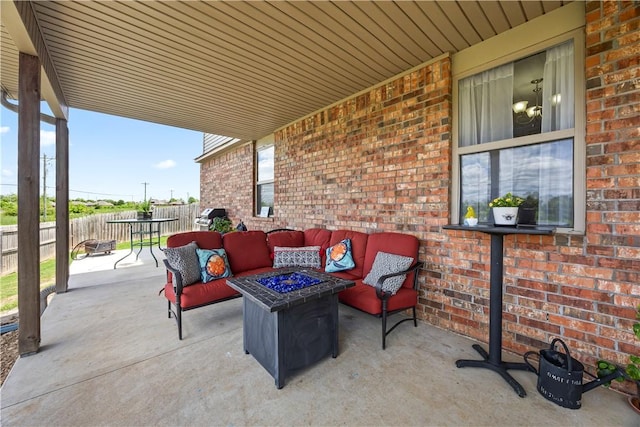 4208 SW Fieldstone Blvd, Bentonville, AR 72712 - view of patio / terrace with an outdoor living space with a fire pit