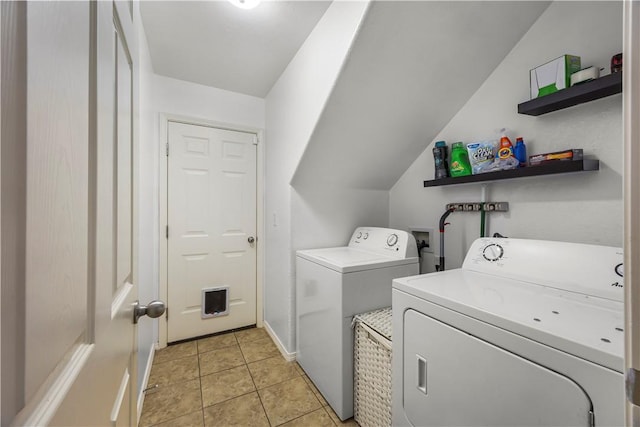 4208 SW Fieldstone Blvd, Bentonville, AR 72712 - laundry room with separate washer and dryer, light tile patterned flooring, and baseboards