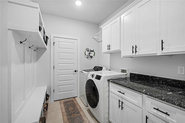 laundry area with washer and dryer, cabinet space, and recessed lighting