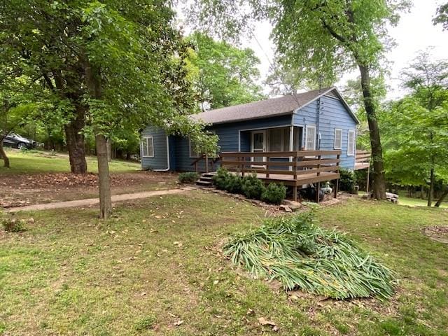 449 N Assembly Dr, Fayetteville, AR 72701 - rear view of property featuring a wooden deck and a yard