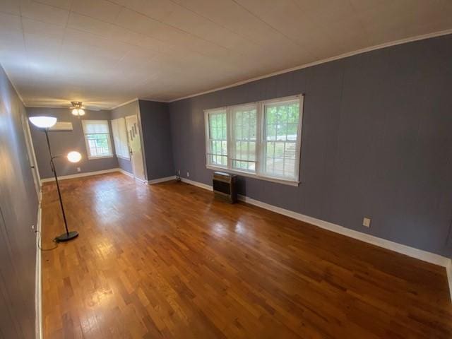 449 N Assembly Dr, Fayetteville, AR 72701 - spare room with wood finished floors, ornamental molding, baseboards, and ceiling fan