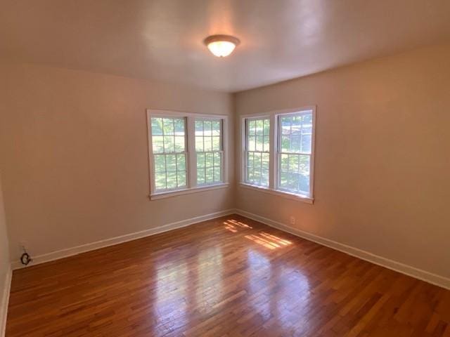 449 N Assembly Dr, Fayetteville, AR 72701 - empty room featuring baseboards and wood finished floors