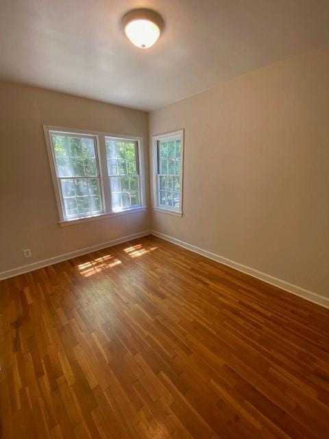 449 N Assembly Dr, Fayetteville, AR 72701 - empty room featuring baseboards and wood finished floors