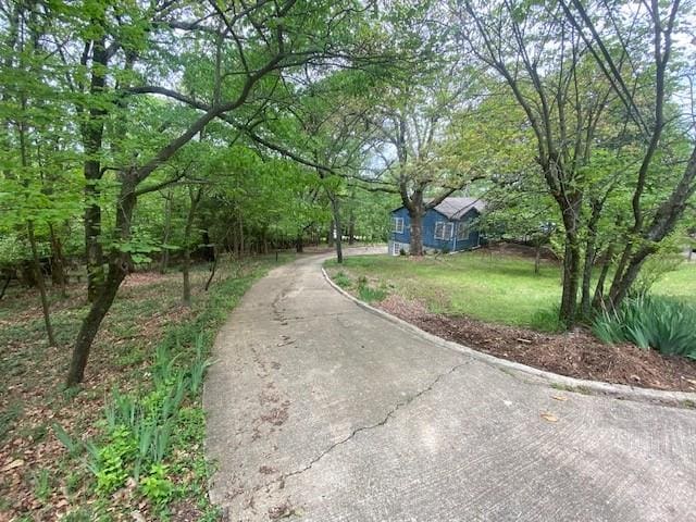 449 N Assembly Dr, Fayetteville, AR 72701 - view of asphalt road featuring curbs