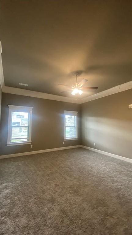 1912 Hale Ln, Pea Ridge, AR 72751 - empty room with ornamental molding, a ceiling fan, baseboards, and dark colored carpet