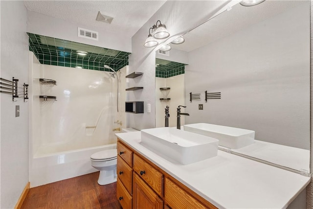 18322 Oakridge Rd, Springdale, AR 72764 - full bath featuring wood finished floors, shower / bath combination, toilet, and vanity