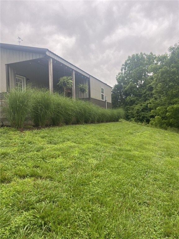 14210 Lake Point Dr, Lowell, AR 72745 - view of grassy yard