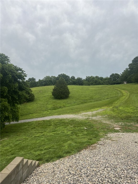 14210 Lake Point Dr, Lowell, AR 72745 - view of property's community featuring a lawn