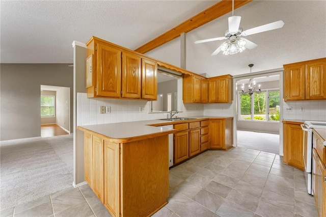 12 Luncarty Ln, Bella Vista, AR 72715 - kitchen with light carpet, white range, ceiling fan, light countertops, and a chandelier