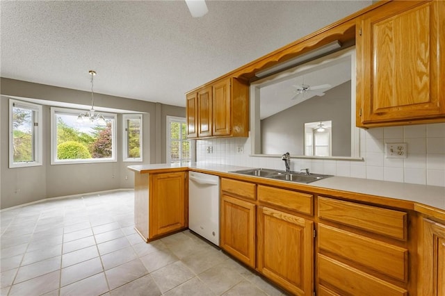 12 Luncarty Ln, Bella Vista, AR 72715 - kitchen with dishwasher, a ceiling fan, backsplash, brown cabinetry, and vaulted ceiling